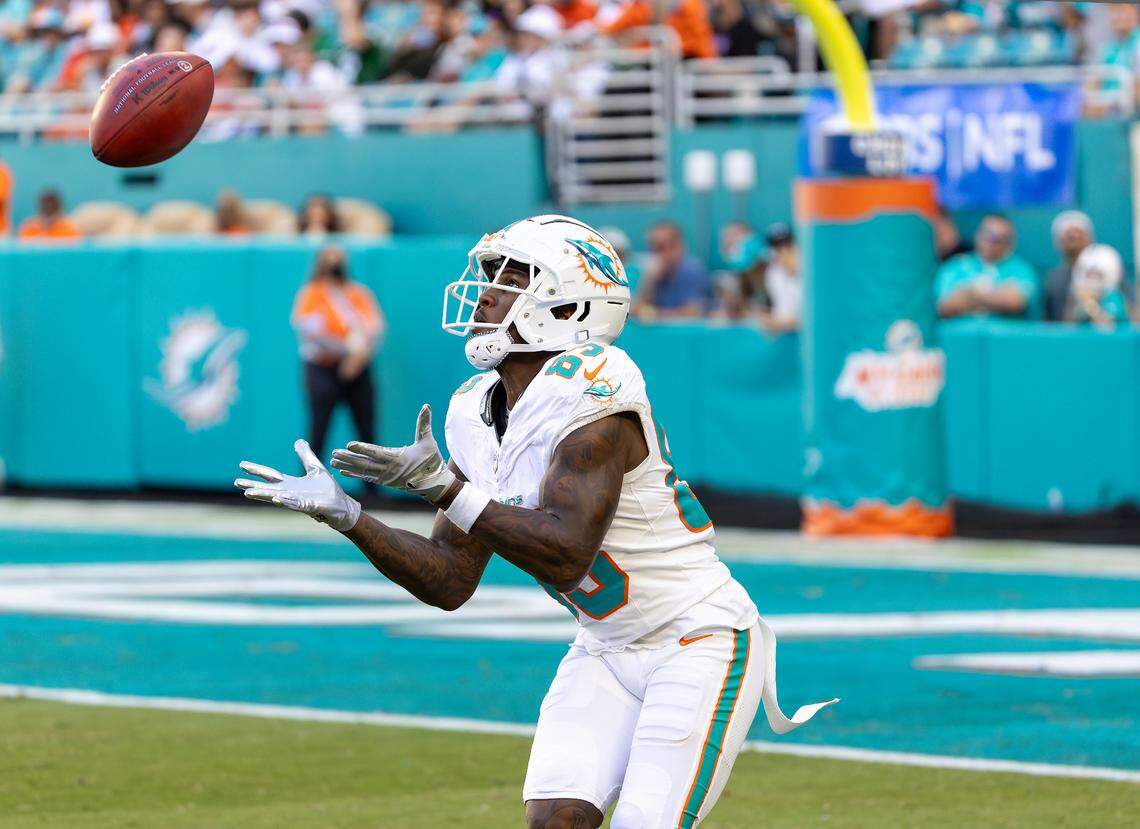 Miami Dolphins wide receiver Malik Washington (83) catches a punt in the second half of their NFL game against the New York Jets at Hard Rock Stadium on Sunday, Dec. 8, 2024, in Miami Gardens, Fla