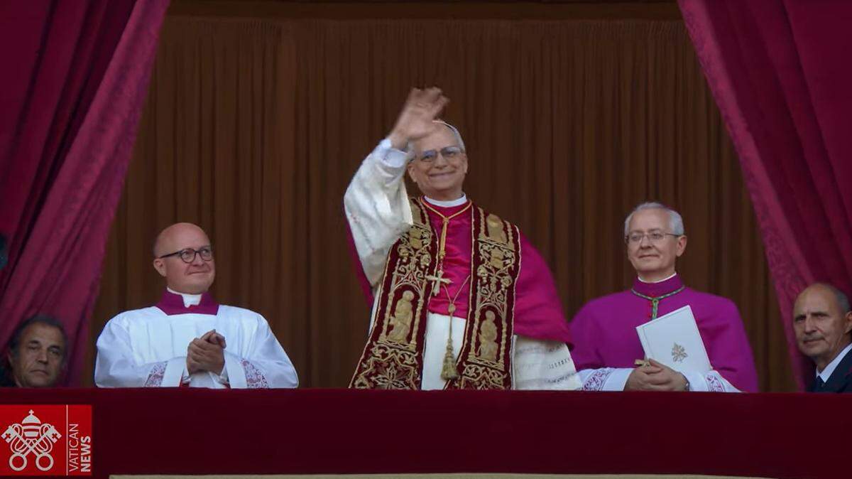 Pope Leo XIV greets crowds gathered in the Vatican City on May 8 in his first appearance as the head of the Holy See.
