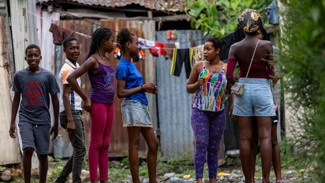 Young people mingle at a displacement camp in Leogane, Haiti. Children area among large number of Haitians who have been forced from their homes by armed gangs.