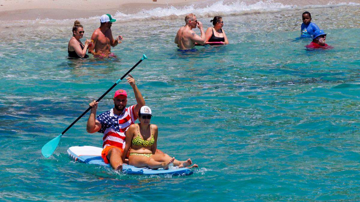 FILE - Beachgoers enjoyed the sunny and hot day during Memorial Day on Monday, May 27, 2024 in Sunny Isles Beach.