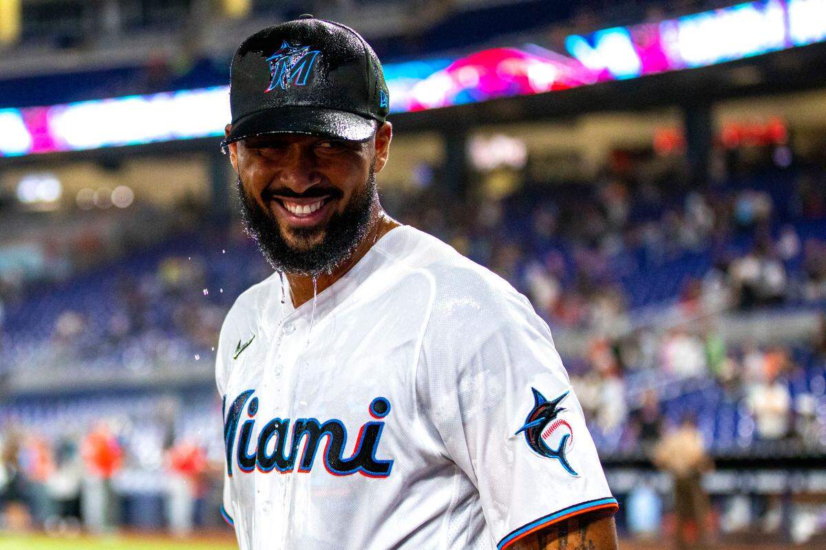 Miami Marlins pitcher Sandy Alcantara (22) reacts to getting doused with water after defeating the Cincinnati Reds 3-0 in nine innings of an MLB game at loanDepot park in the Little Havana neighborhood of Miami, Florida, on Wednesday, August 3, 2022.