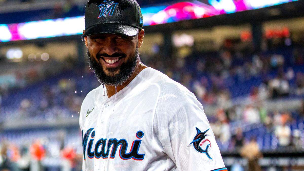 Miami Marlins pitcher Sandy Alcantara (22) reacts to getting doused with water after defeating the Cincinnati Reds 3-0 in nine innings of an MLB game at loanDepot park in the Little Havana neighborhood of Miami, Florida, on Wednesday, August 3, 2022.