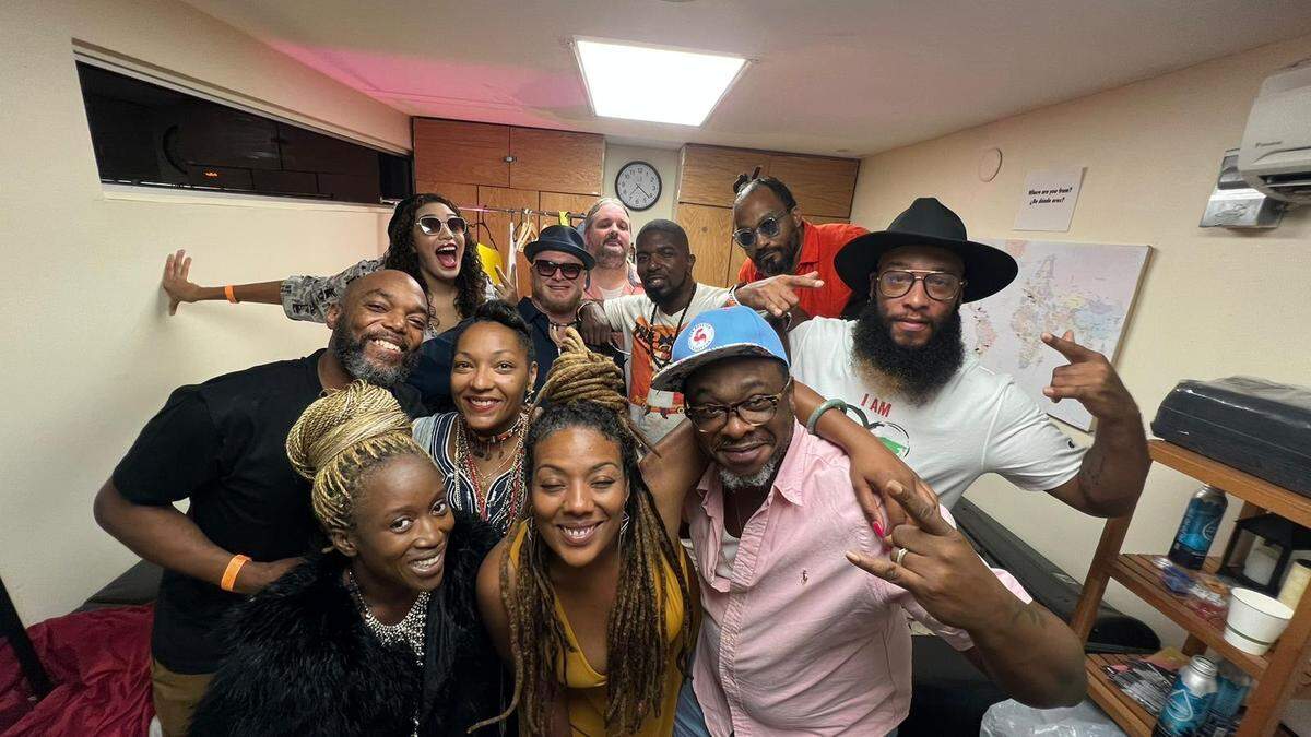 Jarobi White (pink shirt) pictured after LOVEisLOVE Miami 2022. The 2023 iteration will celebrate 50 years of hip-hop through a combination of activities highlighting the genre’s five elements: DJs, MCs, breakdance, grafitti and knowledge.