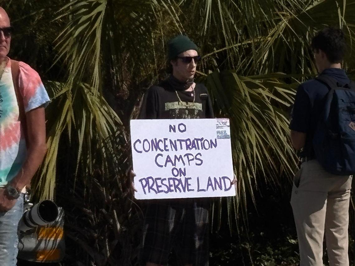 Ochopee, Florida, July 1, 2025 - Protesters rally near the Dade Collier Training and Transition Airport popularly known as ‘Alligator Alcatraz” to voice their opposition to the facility on the day when President Trump visited the facility