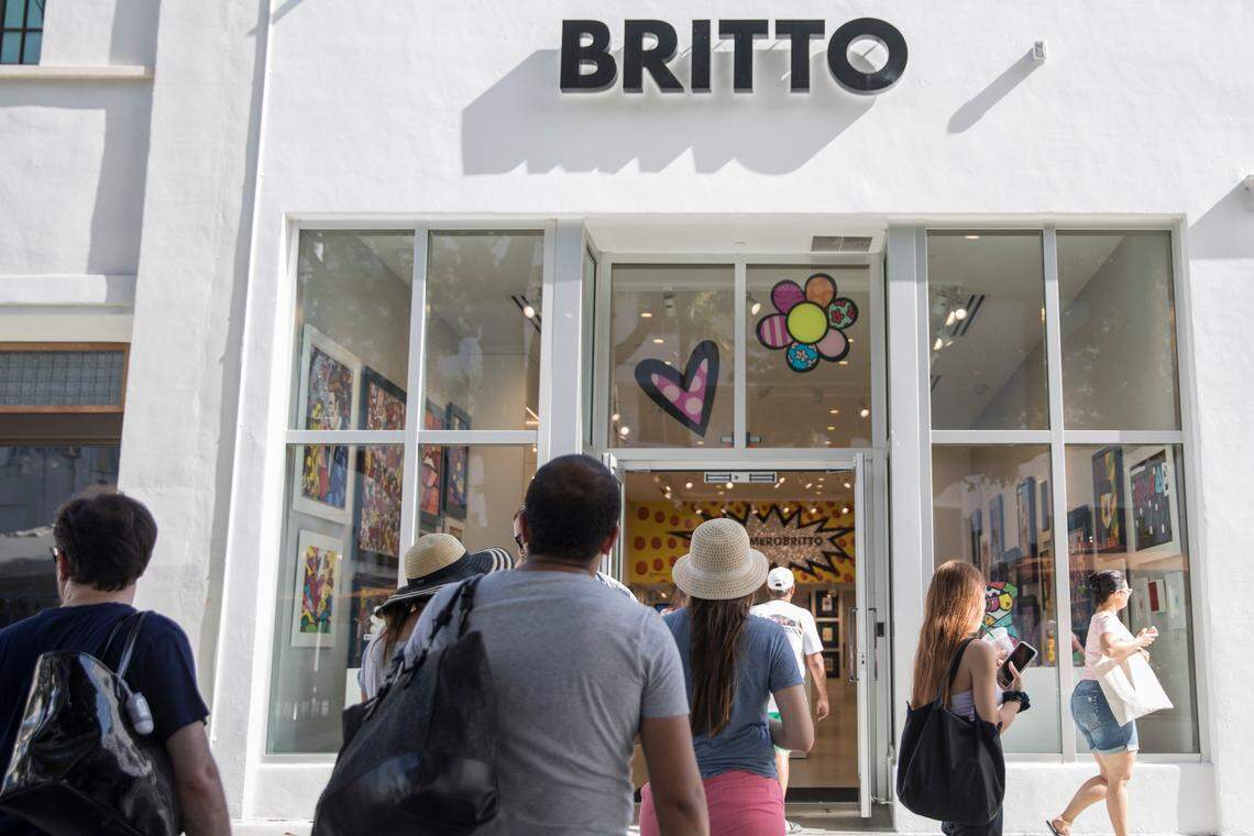 Shoppers enter Romero Britto's gallery at 1102 Lincoln Road on Saturday, June 16, 2018. According to court documents, Britto is attempting to break his lease due to an alleged hostile environment on the historic shopping road.