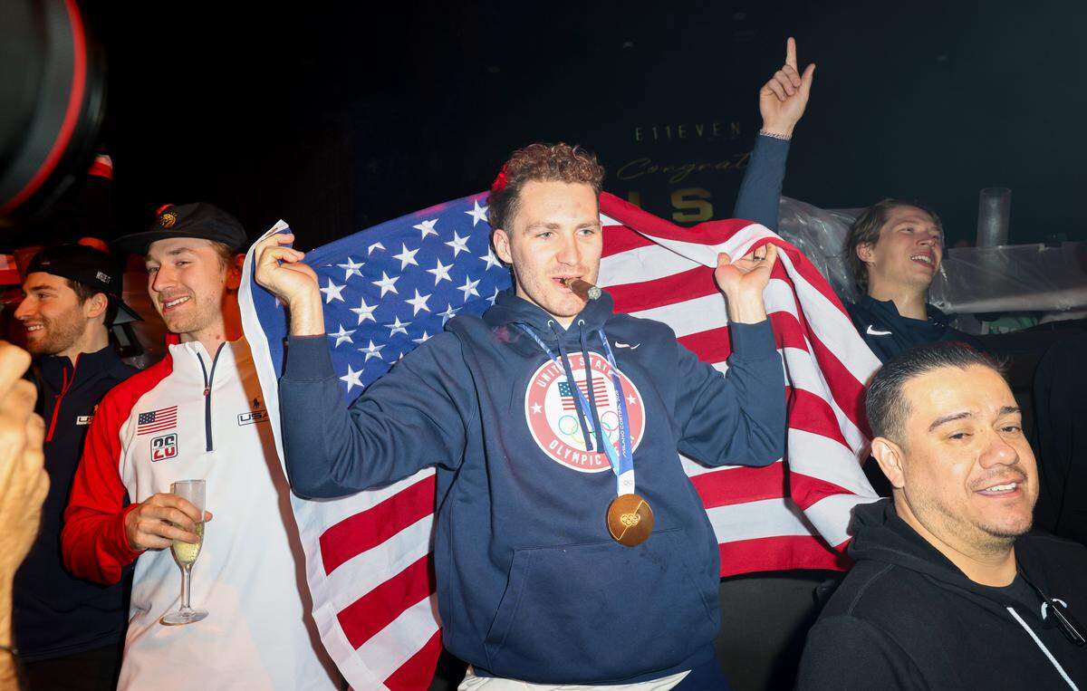 MIAMI, FLORIDA - FEBRUARY 23: Matthew Tkachuk holds a flag during a celebration of the USA Men's Hockey Team's Olympic Gold at E11EVEN Miami on February 23, 2026 in Miami, Florida.  (Photo by Alexander Tamargo/Getty Images for E11EVEN Miami)