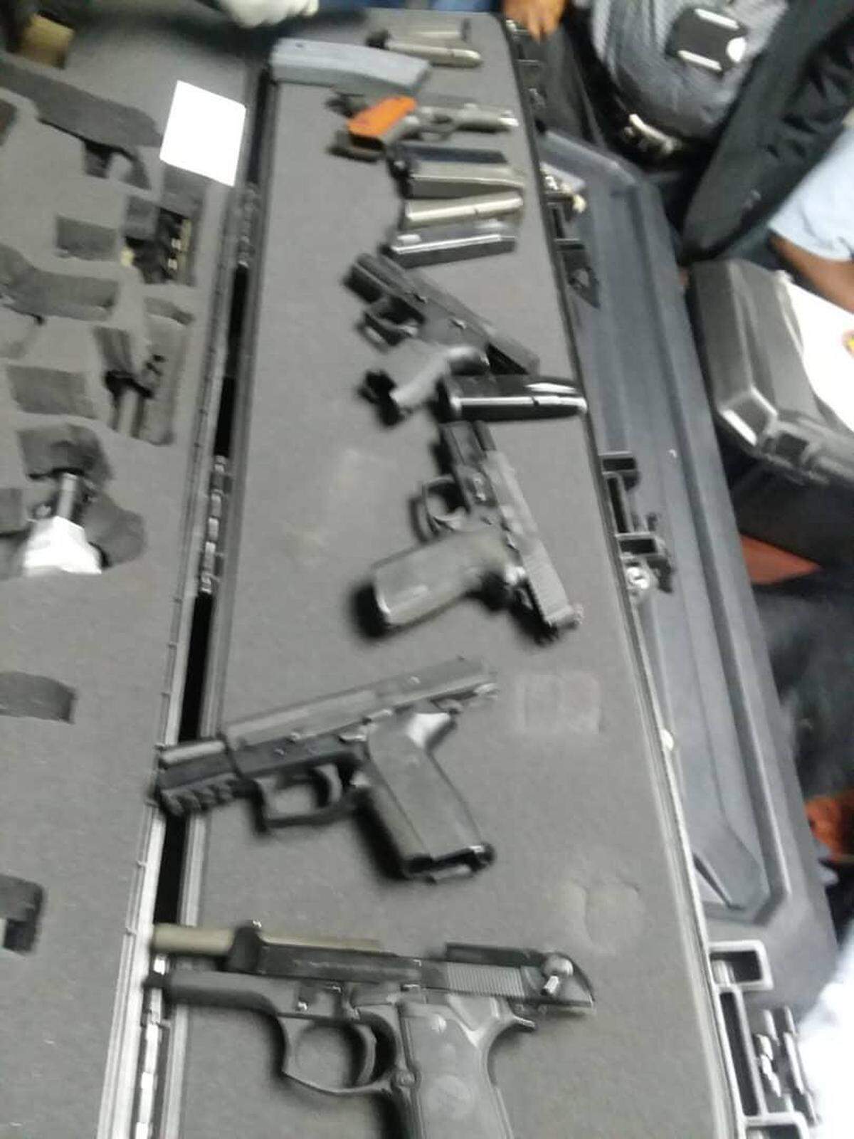 This photo of the weapons brought into Haiti by Jacques Yves Duroseau was circulated on social media after Duroseau’s arrest in Port-au-Prince Tuesday after arriving aboard an American Airlines flight from Miami. Two police officials confirmed that the photos are from the incident.