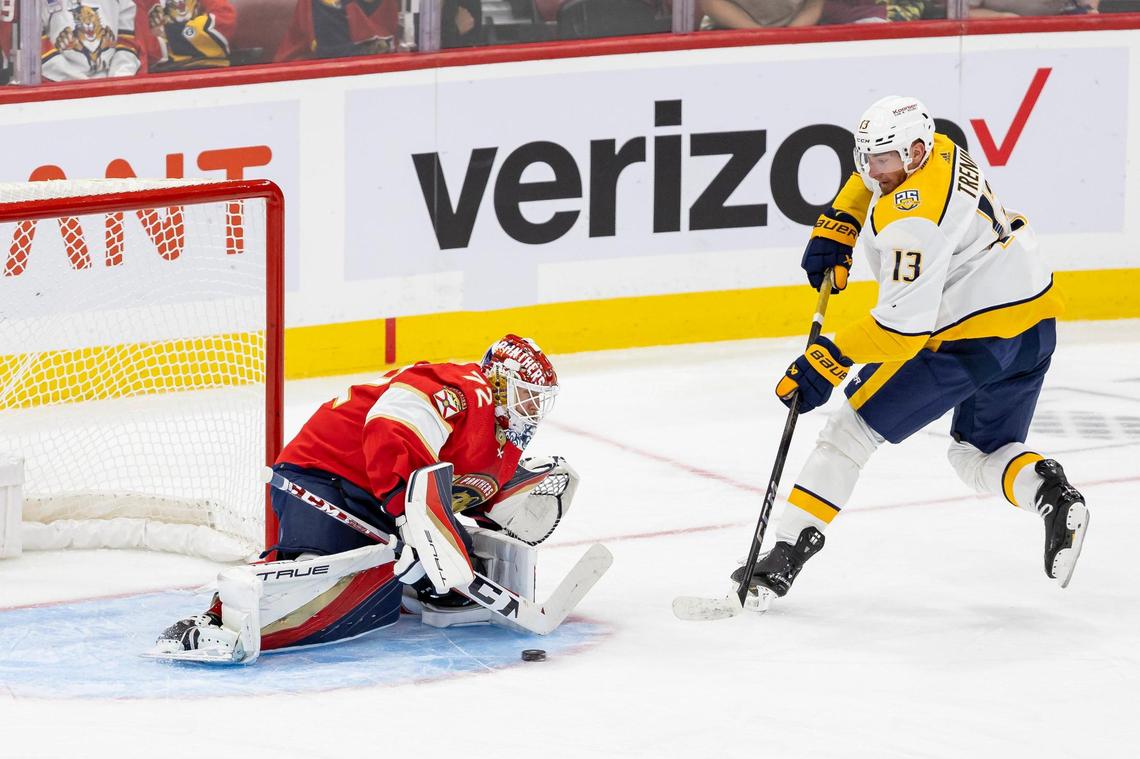 Florida Panthers goaltender Sergei Bobrovsky (72) blocks a shot by Nashville Predators forward Yakov Trenin (13) in the second period of their NHL preseason game at the Amerant Bank Arena on Monday, Sept. 25, 2023, in Sunrise, Fla.