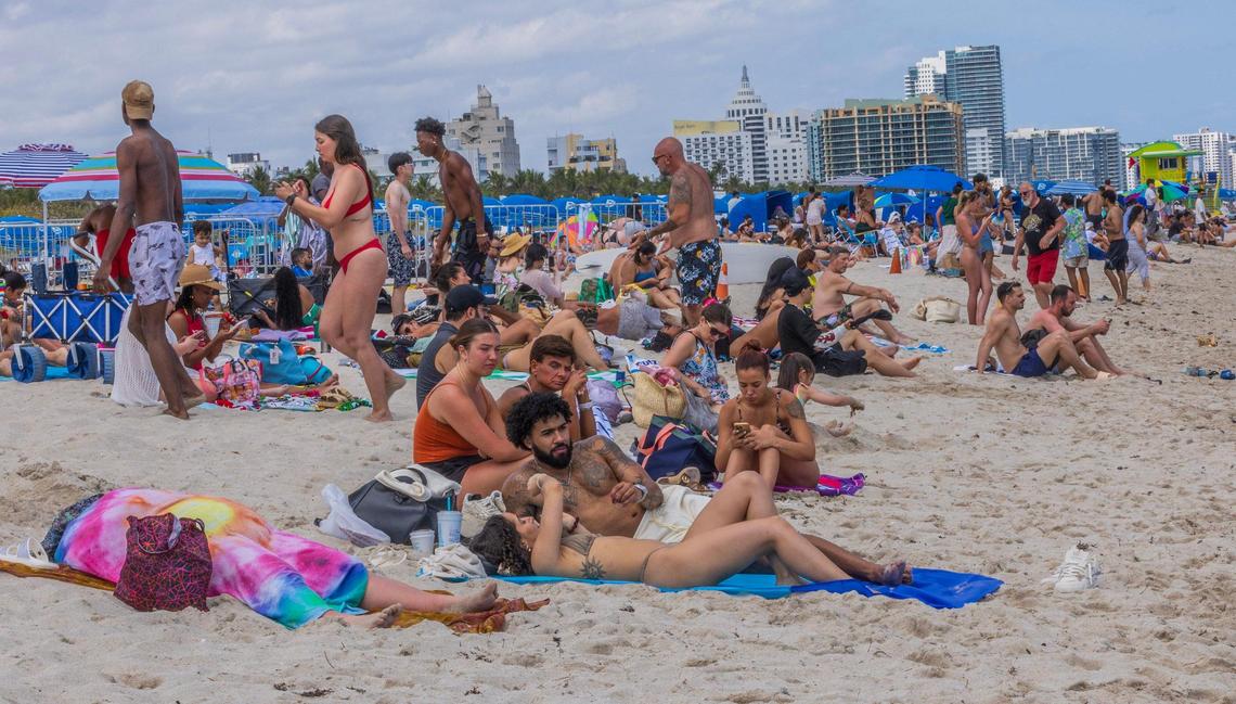 Beachgoers enjoy the nice weather in South Beach, during spring break, in Miami Beach, Florida, on Saturday March 22, 2025.