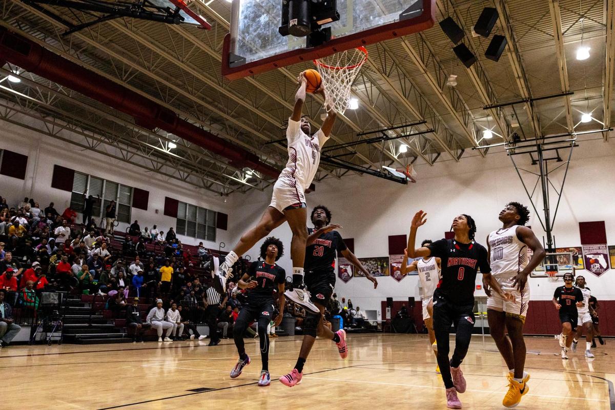 Norland forward Marcus Allen (4) dunks the ball as Northeast defenders look on during the Regional 4-5A boys basketball semifinal in Miami Gardens, Florida on Tuesday, February 20, 2024.