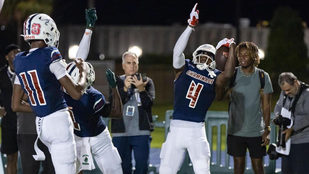 Chaminade-Madonna Lions wide receiver Jeremiah Smith (4) celebrates with his teammates after scoring a touchdown against the Central Rockets in the second quarter of their high school football game at the Nathaniel Traz Powell Stadium on Thursday, Sept. 21, 2023, in Miami, Fla.