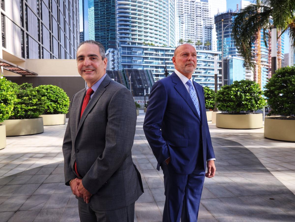 Alberto Milo Jr., left, president of the Related Urban, and Steve Patterson, right, president and CEO of Related Development, stand at the site of a planned Related Group rental apartment and condo development project at 444 Brickell in Miami, Florida, on Tuesday, October 27, 2020.