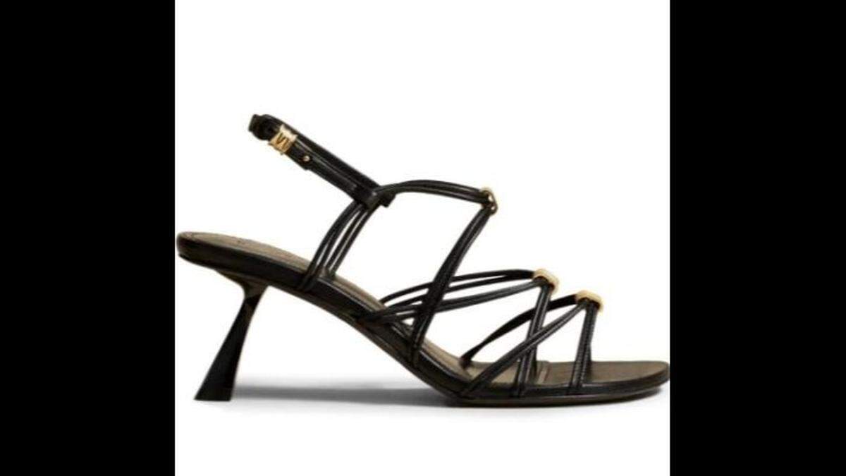 Khaite’s Louisa Strappy Sandal in Black leather.