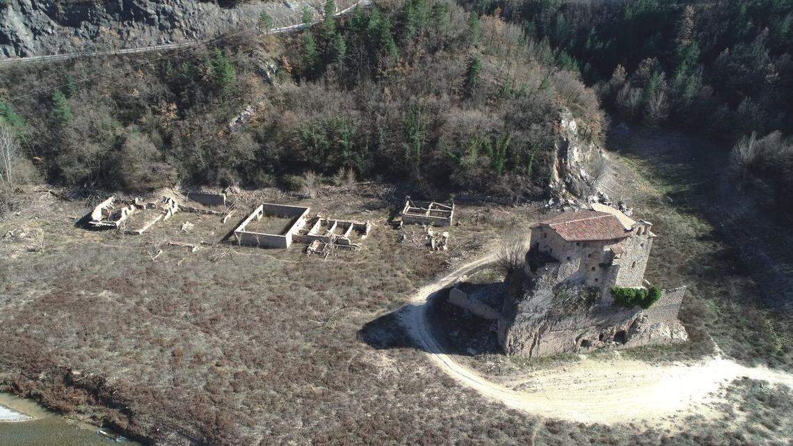 Ongoing drought and shrinking water levels in a Catalonia reservoir fully exposed the monastery of Sant Salvador de la Vedella, photos show.