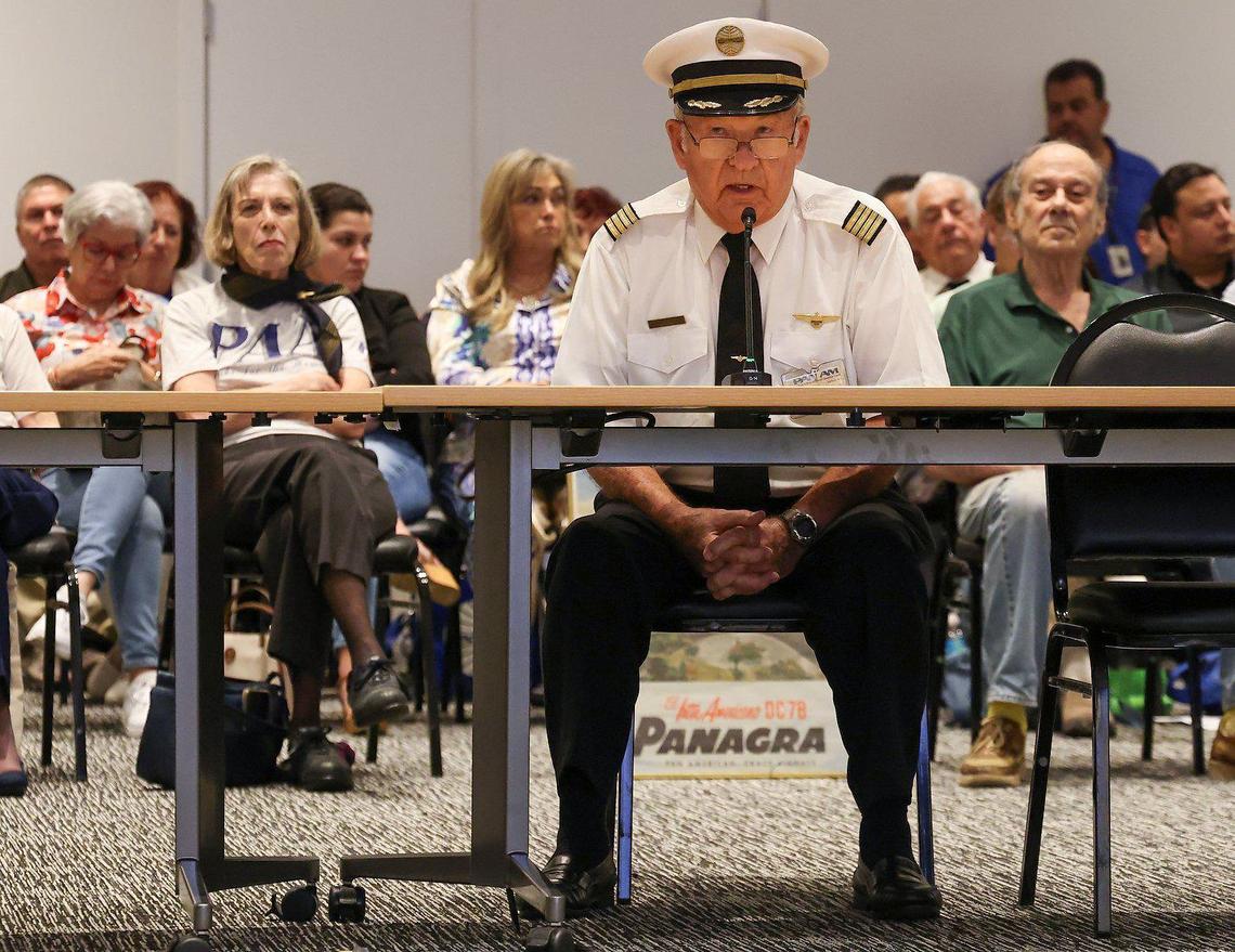 Former Pan Am pilot Stuart Archer wears his old uniform while asking the Miami-Dade County historic preservation board, meeting at the Miami-Dade Main Library, to designate a 1929 hangar built by airline founder Juan Trippe, the last standing original building at Miami International Airport, as a historic landmark.