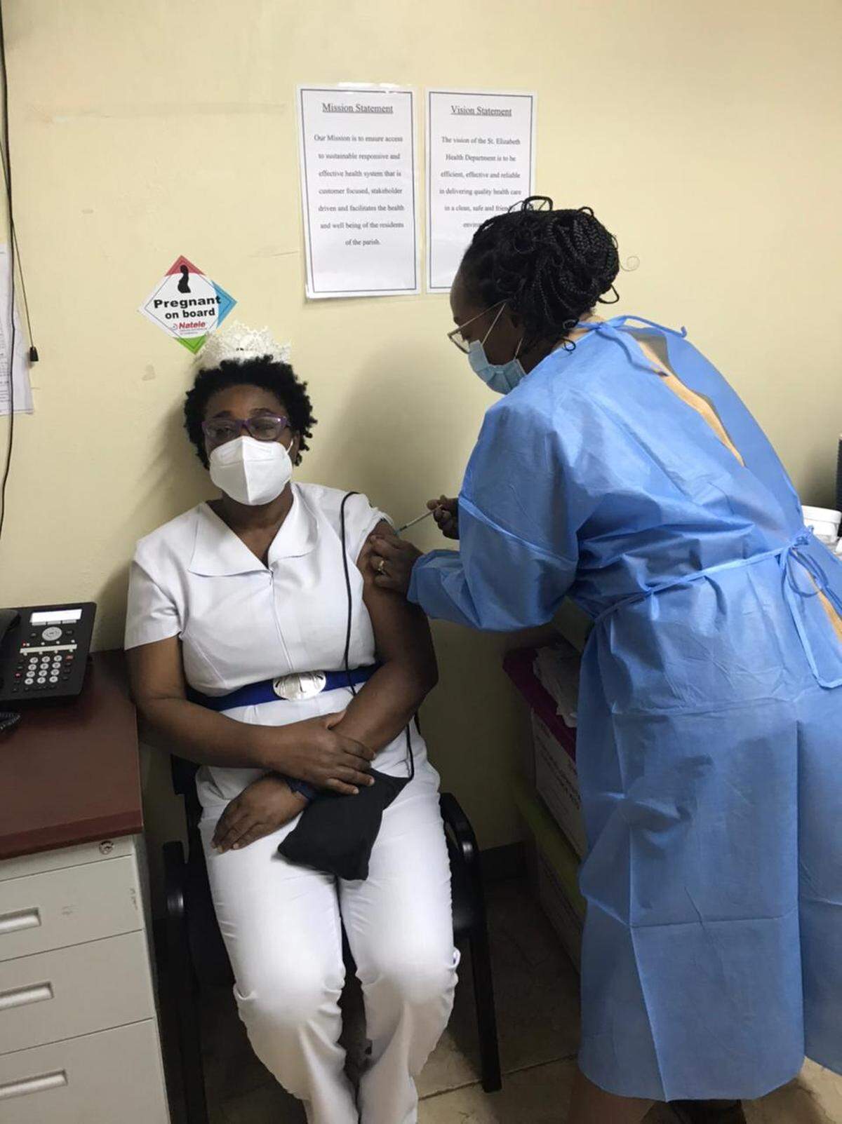 Erica Myers, acting deputy director of nursing services at the Black River Hospital in Manchester, Jamaica, becomes the first to receive a COVID-19 vaccine in St. Elizabeth Parish on Wednesday, March 10, 2021. Myers is also an infection control nurse.
