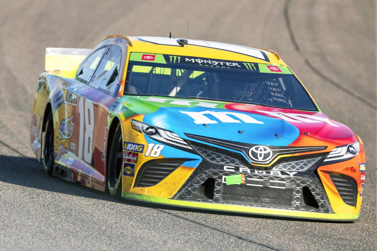 Kyle Busch (18) takes a turn during the Homestead-Miami Speedway NASCAR 21st Annual Ford EcoBoost 400 Monster Energy Series in Homestead, Florida on Sunday, Nov. 17, 2019.
