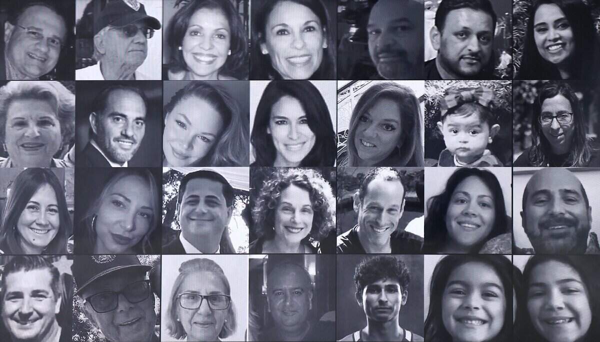Photos of all 98 victims are displayed on a screen as Surfside holds its 5th Annual Remembrance event on Wednesday, June 24, 2026, in Surfside, Fla. The ceremony honors those killed in the Champlain Towers South building collapse.