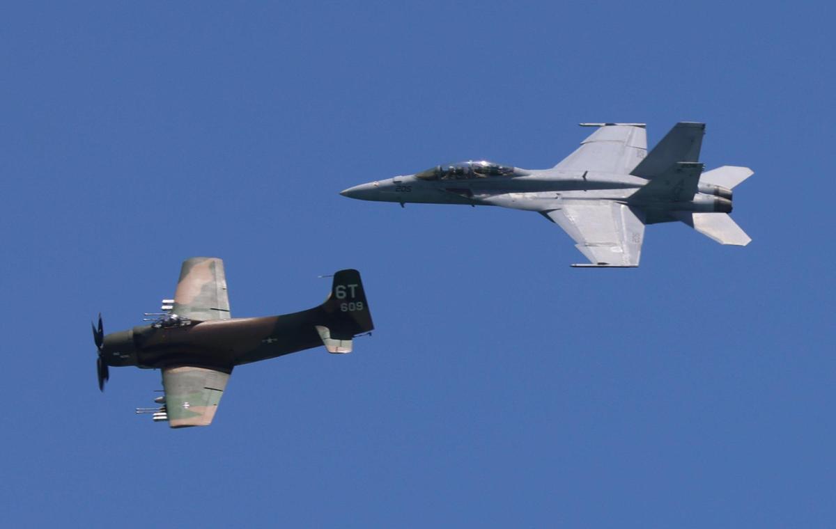 Old plane meets modern jet as the World War II aircraft flies along side a F-18 above the beaches of SoBe. On Sunday, May 28, 2023 the Hyundai Air & Sea Show returned to Miami Beach on Memorial Day Weekend (May 27, 2023 and May 28, 2023.) The event showcases the men, women, technology, and equipment from all five branches of the United States military as well as local police, firefighters, and their first responder agencies. The four block long Display Village that contains a Kid Zone, flight and navigation simulators, tactical training equipment, rifle range simulators, interactive displays from all five branches of the U.S. Military and the Monster Energy Action Zone which showcases a one-of-a-kind action-packed motocross performance by Keith Sayer’s FMX (Freestyle Motocross) demonstration team.