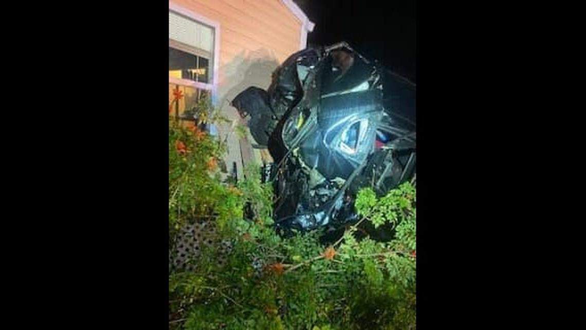 A Port St. Lucie man is charged with criminal mischief after a stolen car got stuck on railroad tracks, where a train catapulted it into a home, deputies say.