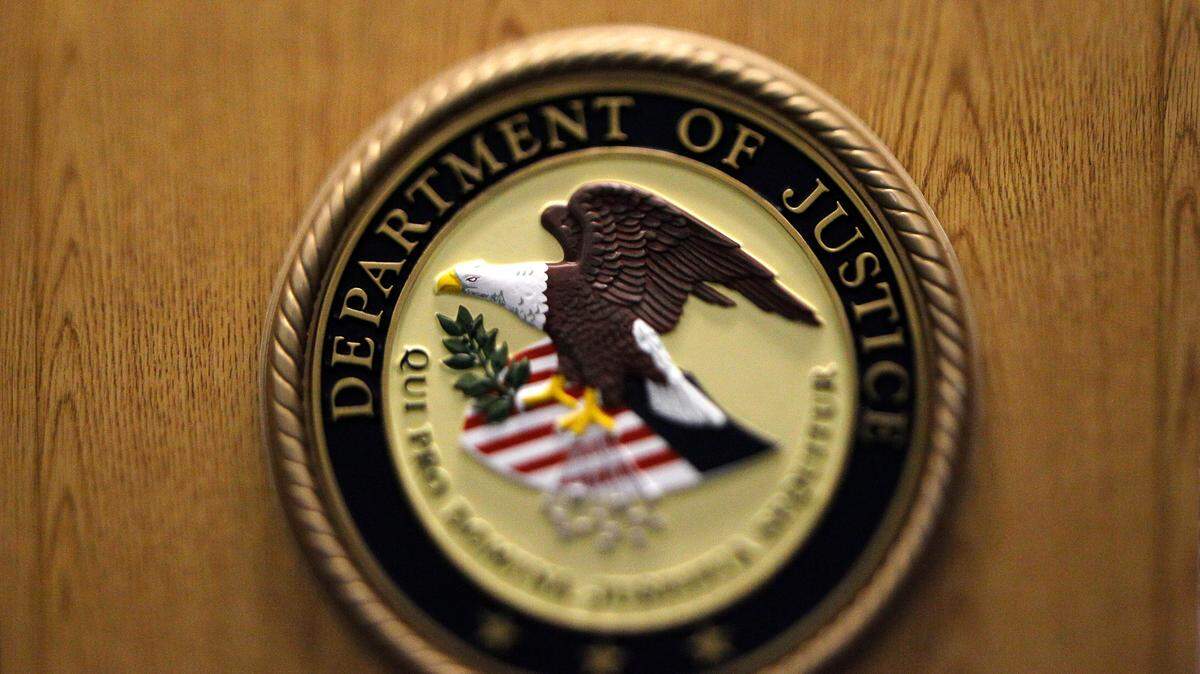 The former senior Navy director is accused of trading confidential information for bribes. (AP Photo/Matt Slocum)