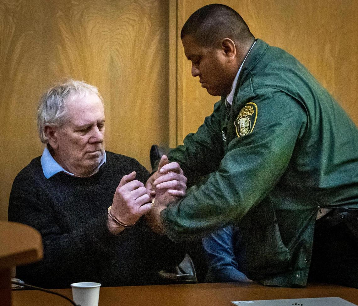 A Dept. of Corrections officer handcuffs Robert Koehler after he was found guilty on all counts at the Richard E. Gerstein Justice Building on Wednesday, Jan. 25, 2023.