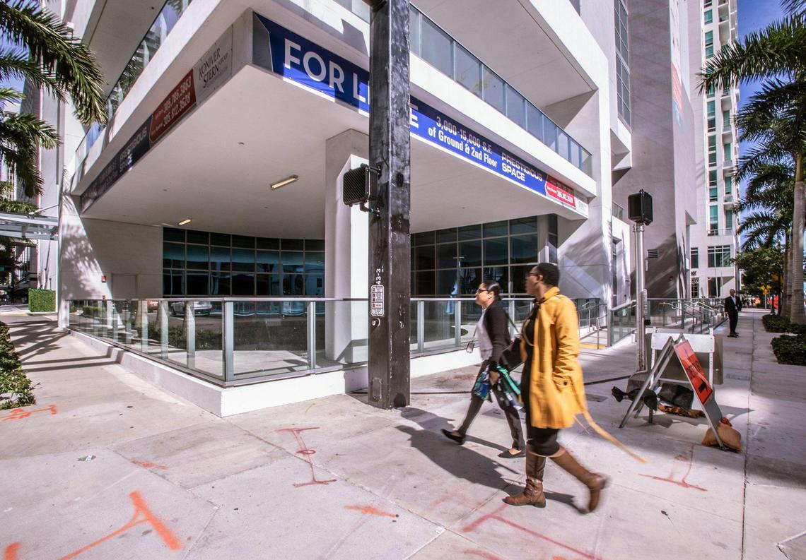 The Southwest Circle, with remains from the Tequesta Indians’ settlement, is on display behind a glass railing at Met Square in downtown Miami.
