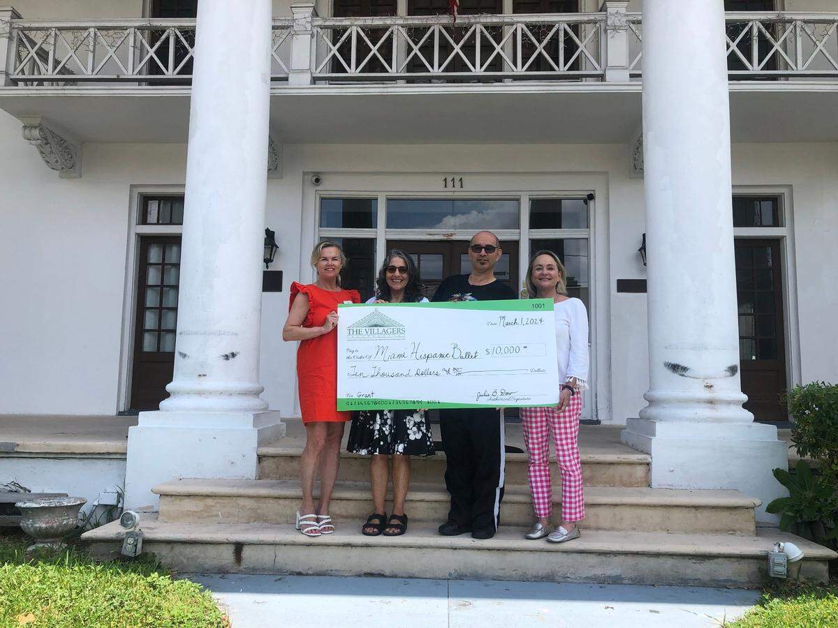  The Villagers present a $10,000 grant to the Miami Hispanic Ballet to help with renovation work. From left, Villagers Gina Guilford and Paula Volpe, Executive-Artistic Director of the Miami Hispanic Ballet Eriberto Jimenez, and Villager Kelley Schild. 