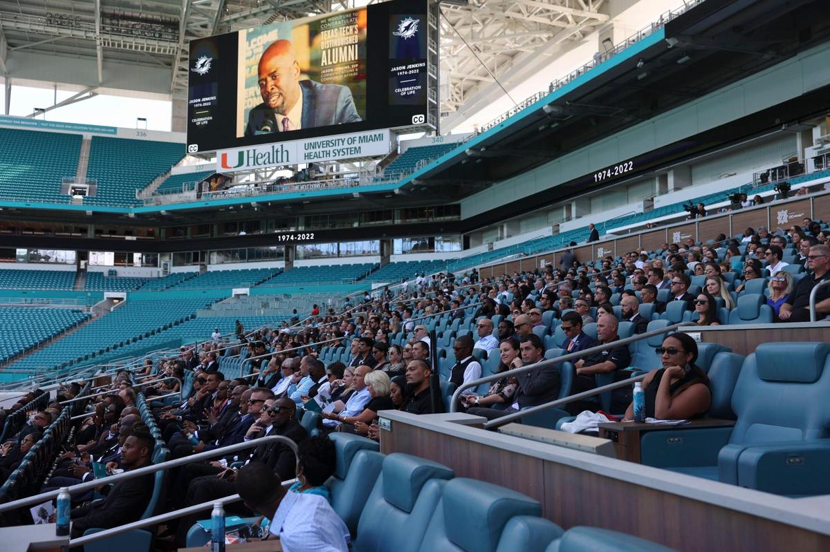 People listen to music and a slide show during Jason Jenkins Celebration of Life on Monday, Sept. 5, 2022, at the Hard Rock Stadium in Miami Gardens. Jenkins was the Senior Vice President of Communications and Community Affairs for the Miami Dolphins.