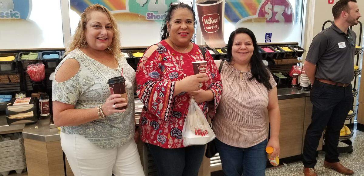 Lizette Espinosa, Esther Marin and Maria Marin were among the Wawa fans who turned out Thursday, May 9, 2019, for the opening of the store on Southwest 24th Street.