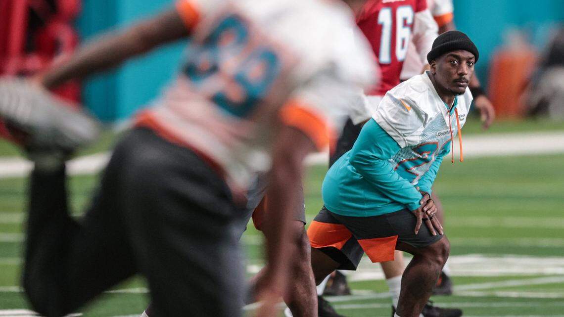 Miami Dolphins running back Duke Johnson (28) stretches before practice at Baptist Health Training Complex in Miami Gardens on Wednesday, October 27, 2021.