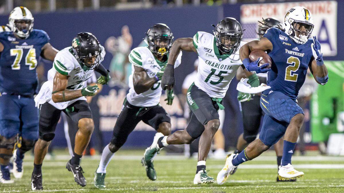 Florida International University running back Anthony Jones (2) runs 41 yards to score one of his three consecutive touchdown runs to open the second half of a football game against the Charlotte 49ers at Riccardo Silva Stadium in Miami, Florida on Saturday, October 12, 2019.