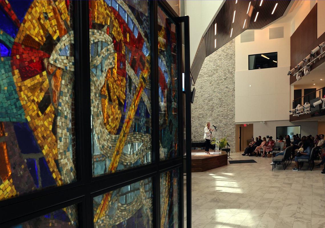 The old stained glass windows now serve as doors to the First United Methodist Church’s new sanctuary, where Senior Pastor Audrey Warren delivers her Sunday sermon. In 2018, First UMC of Miami sold its aging downtown building for $55 million to a developer.
