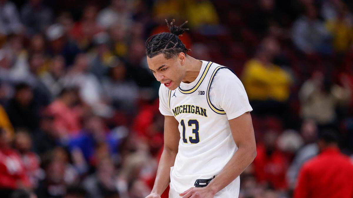 Michigan Wolverines guard Jett Howard (13) reacts after scoring against the Rutgers Scarlet Knights during the first half at United Center on March 9, 2023, in Chicago, Illinois.