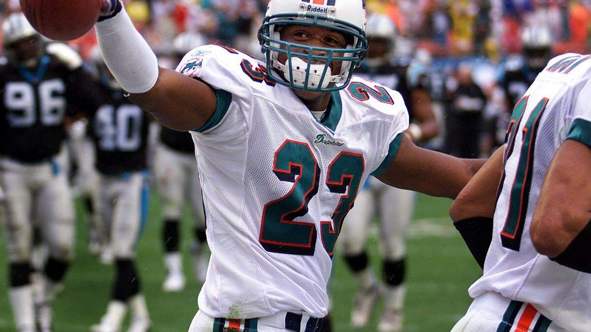 For Sports 11/4/01 Photo by Joe Rimkus Jr/Miami Herald Staff...At Pro Player Stadium The Miami Dolphins host the Carolina Panthers...In Qt # 2 Patrick Surtain celebrates his interception for TD.