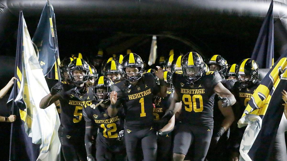 American Heritage Patriots take a field for the game against the Norland Vikings during Region 4-4A championship on Friday, November 29, 2024 at American Heritage HS in Plantation.