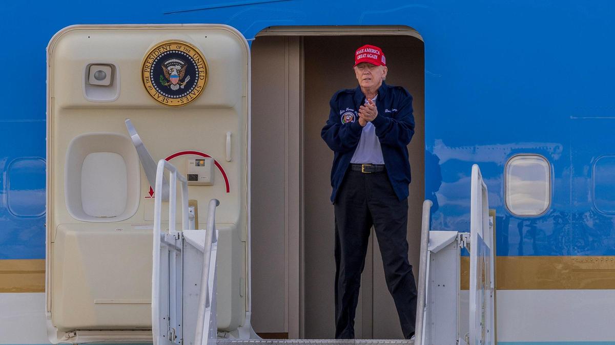 President Donald J. Trump reacts as he arrives on the Air Force One at Miami International Airport, on Wednesday, February 19, 2025.
