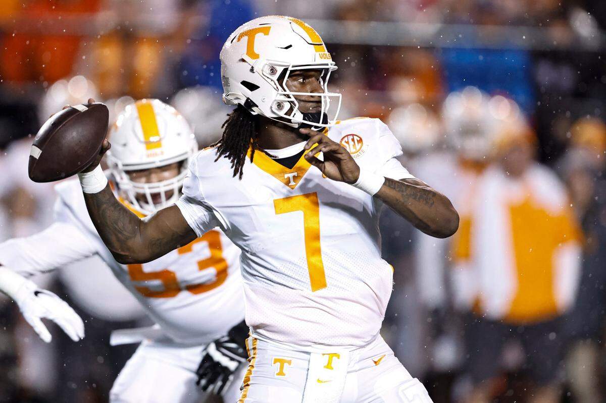 Tennessee quarterback Joe Milton III (7) throws to a receiver during the first half of the team’s NCAA college football game against Vanderbilt, Saturday, Nov. 26, 2022, in Nashville, Tenn.