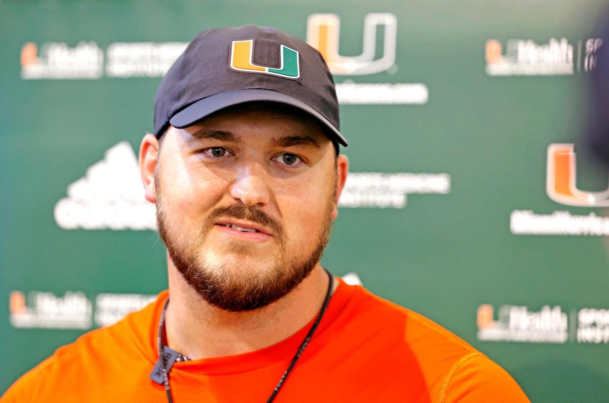 Miami Hurricanes tight ends coach Cody Woodiel speaks to reporters after practice at the Carol Soffer Indoor Practice Facility on the University of Miami campus in Coral Gables on Thursday, March 30, 2023.