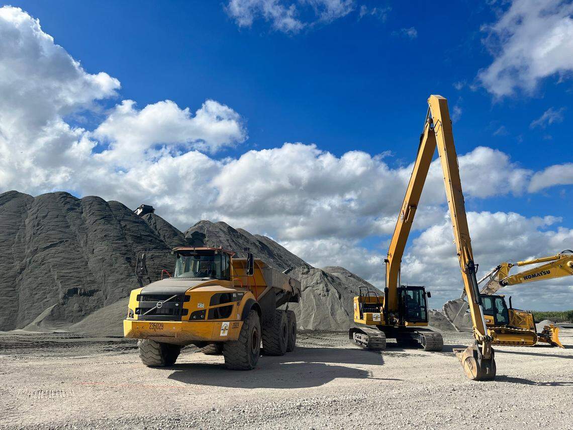 Heavy machinery is lined up in front of a massive pile of granite, the powdery beginnings of construction on the most expensive Everglades restoration project to date, the Everglades Agricultural Area Reservoir, on Wednesday, Feb. 22, 2023.