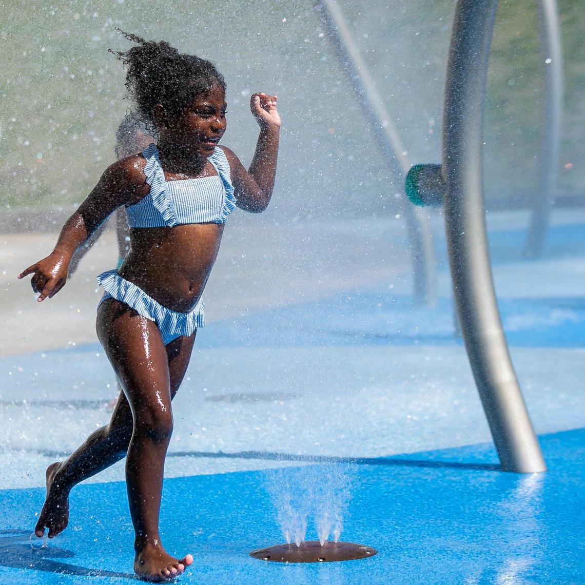 Mia Lurie, 5, plays at South Pointe ParkÕs Wet Playground in Miami Beach, Florida on Monday, February 15, 2021.