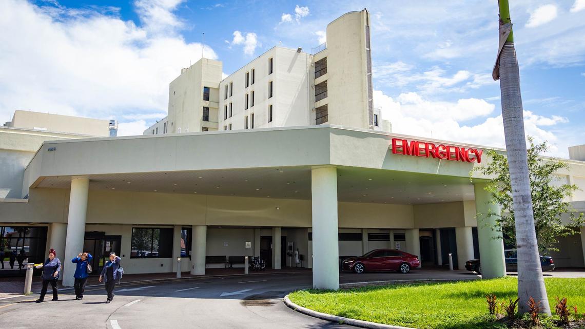 Employees leave Palmetto General Hospital through the emergency entrance on Friday, Sept. 20, 2024, in Hialeah, Florida.