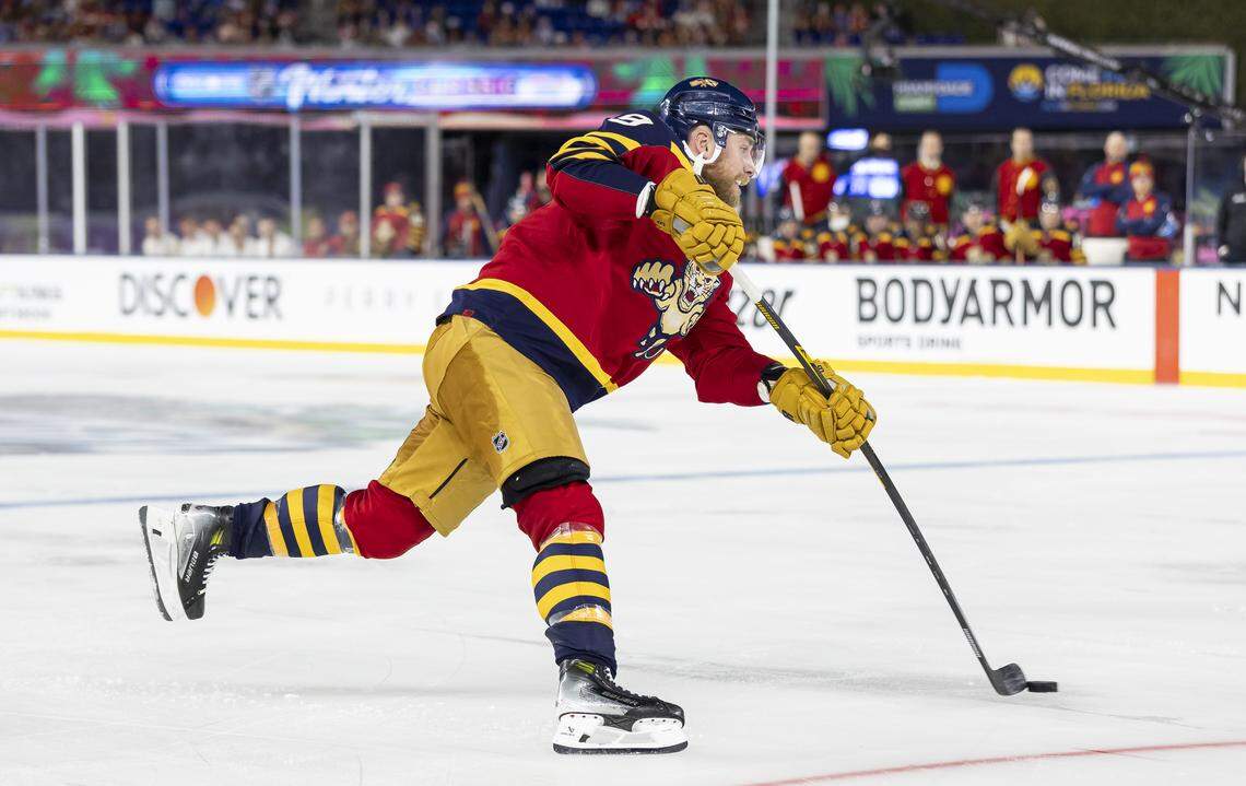 Florida Panthers center Sam Bennett (9) takes a shot toward goal against the New York Rangers in the third period of their Winter Classic outdoor hockey game at loanDepot park on Friday, Jan. 2, 2026, in Miami, Fla.