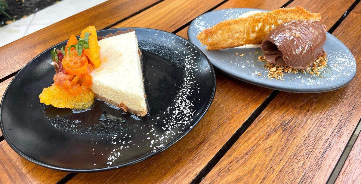 Goat cheese tart and milk chocolate cremoso at Michael’s Genuine Food & Drink