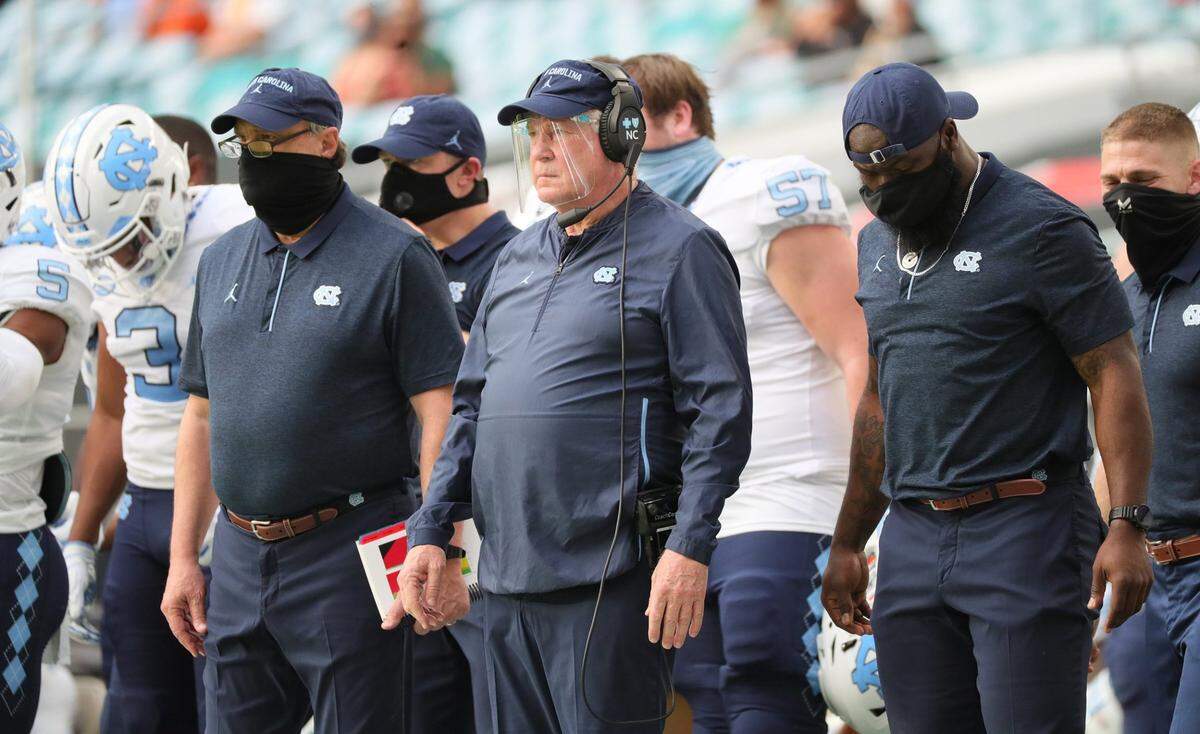 North Carolina Tar Heels coach Mack Brown on the sideline as they play the Miami Hurricanes at Hard Rock Stadium In Miami Gardens, Florida, Saturday, December 12, 2020.
