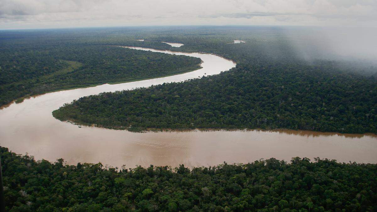 The Itaquai River snakes through the Javari Valley Indigenous territory, Atalaia do Norte, Amazonas state in Brazil in June. Known only as the “Man of the Hole,” a reclusive indigenous man in another part of the rain forest has died, completing the destruction of his tribe.