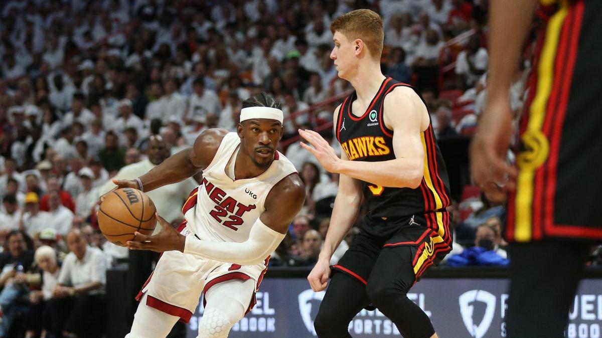 Miami Heat forward Jimmy Butler (22) drives the ball as Atlanta Hawks guard Kevin Huerter (3) defends during game action against the Atlanta Hawks in Round 1 Game 2 of the NBA Playoffs at the FTX Arena in Miami, Florida on Tuesday, April 19, 2022.