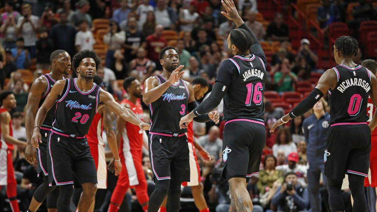 Los jugadores del Heat celebran el triunfo ante los Wizards el 4 de enero en el AmericanAirlines Arena