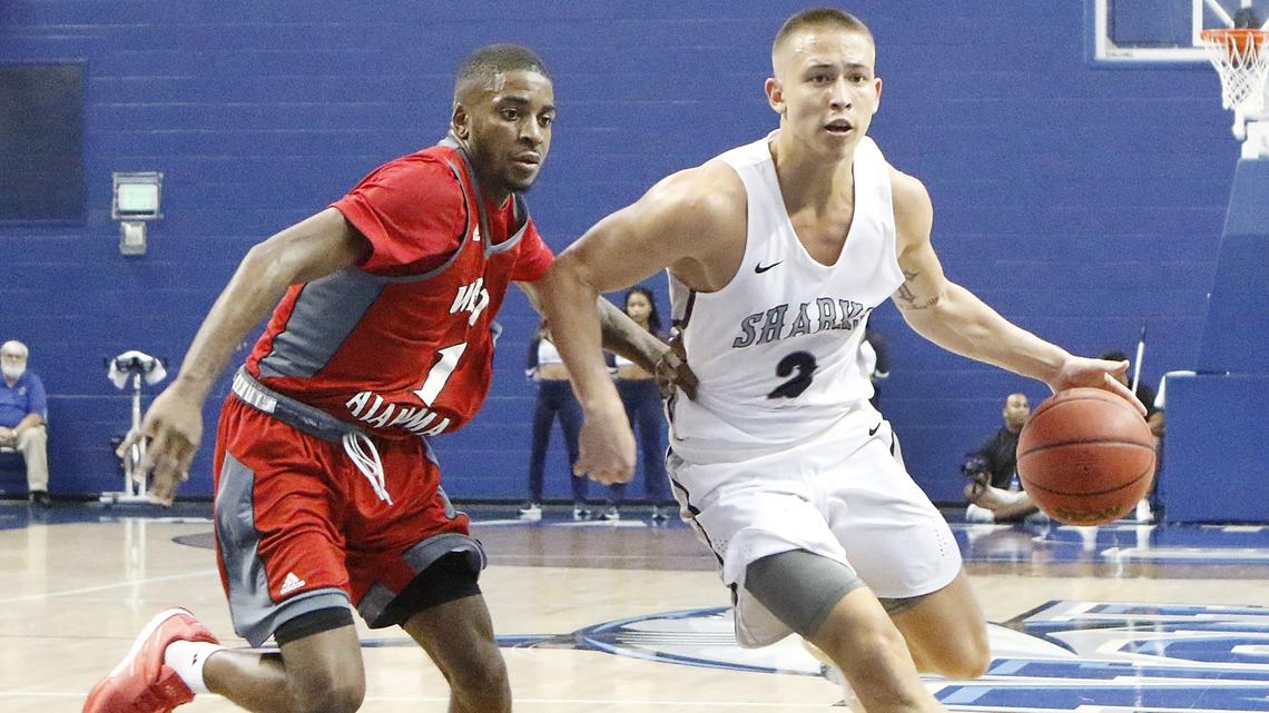 NSU Sharks’ Nick Smith (2) dribbles against West Alabama Tigers during The NCAA 2019 Division II Men’s Basketball semifinal game on Saturday, March 16, 2019 at Rick Case Arena in Fort Lauderdale.
