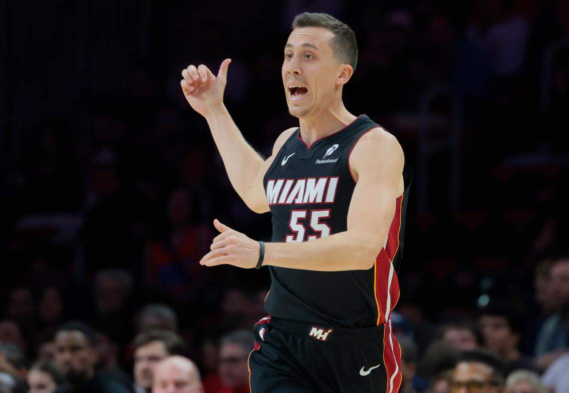 Miami Heat forward Duncan Robinson (55) signals on the court against the Oklahoma City Thunder during the first half of an NBA basketball game at Kaseya Center in Miami on December 20, 2024.
